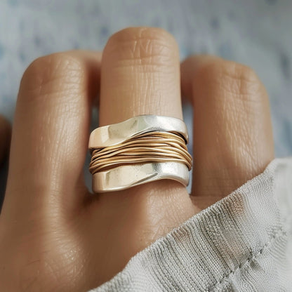 Intrecciato – Anillo de plata con hilo de oro