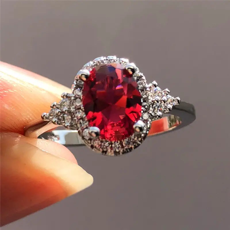 Anillo Halo Plateado con Rubí