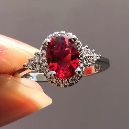 Anillo Halo Plateado con Rubí