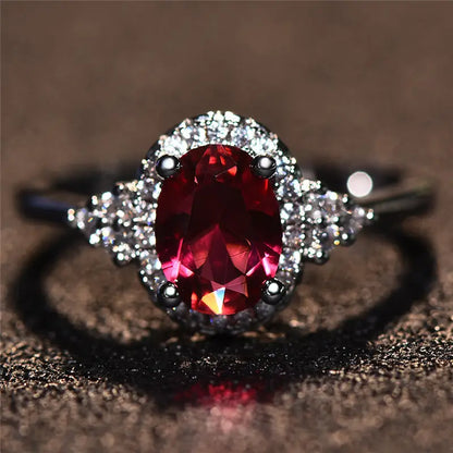 Anillo Halo Plateado con Rubí