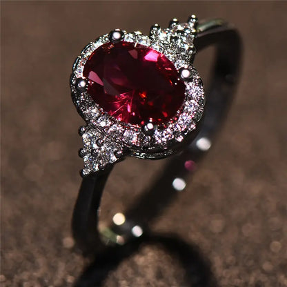 Anillo Halo Plateado con Rubí