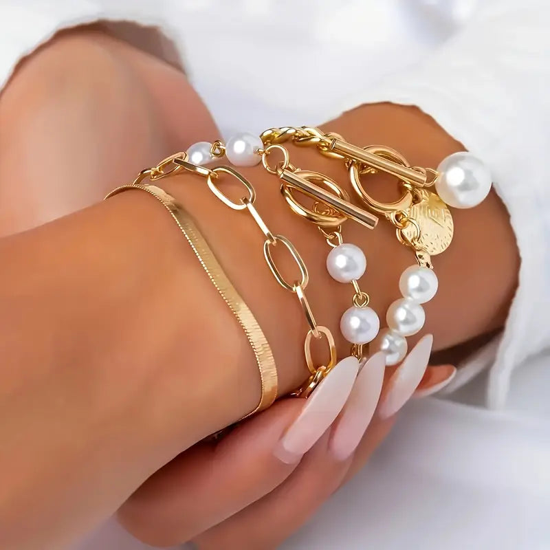 Set de pulseras elegantes de oro (4 piezas) – serpiente, perlas y eslabones.