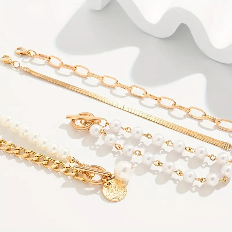 Set de pulseras elegantes de oro (4 piezas) – serpiente, perlas y eslabones.