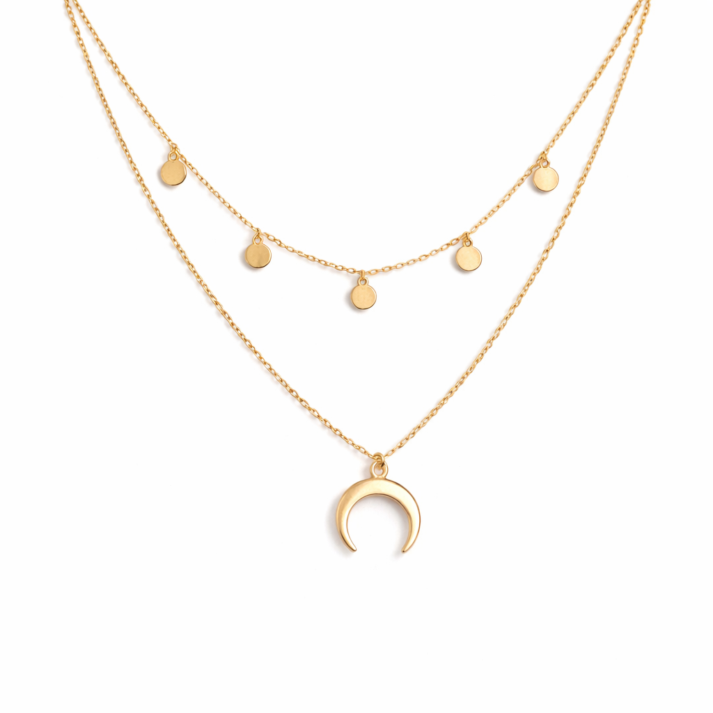 una | Collar dorado elegante con delicado motivo de luna