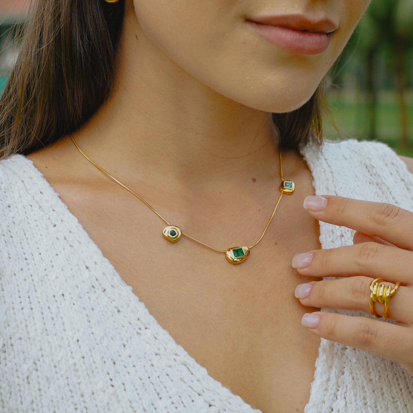 TRIA. Collar